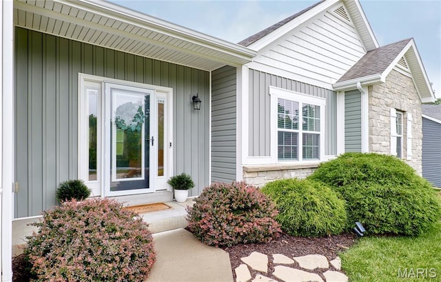 1810 Barclay Bluff Ct, Wentzville, MO 63385 - property entrance with stone siding and board and batten siding