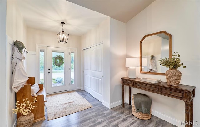 1810 Barclay Bluff Ct, Wentzville, MO 63385 - foyer featuring wood finished floors and a chandelier