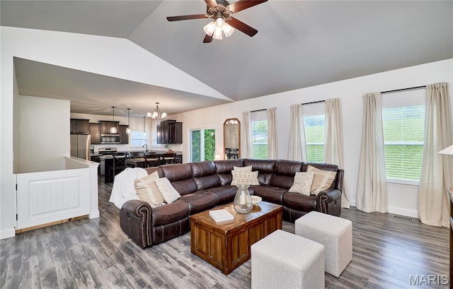 1810 Barclay Bluff Ct, Wentzville, MO 63385 - living room featuring vaulted ceiling, a chandelier, wood finished floors, and a ceiling fan
