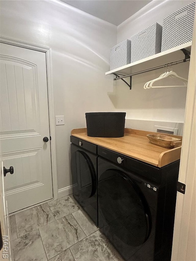 1810 Barclay Bluff Ct, Wentzville, MO 63385 - washroom featuring separate washer and dryer and light marble finish floors