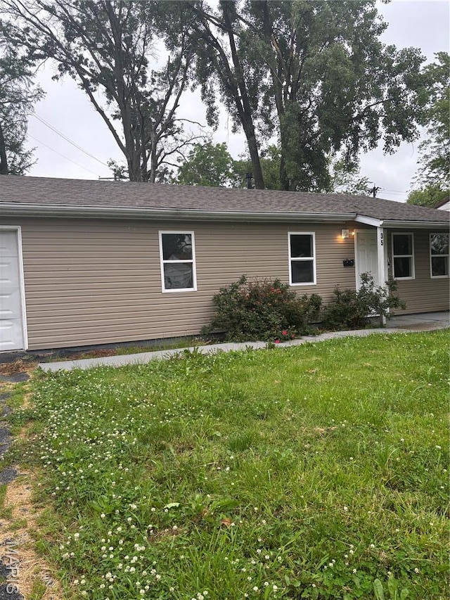 35 Saint Justin Dr E, St Louis, IL 62206 - view of home's exterior with a lawn