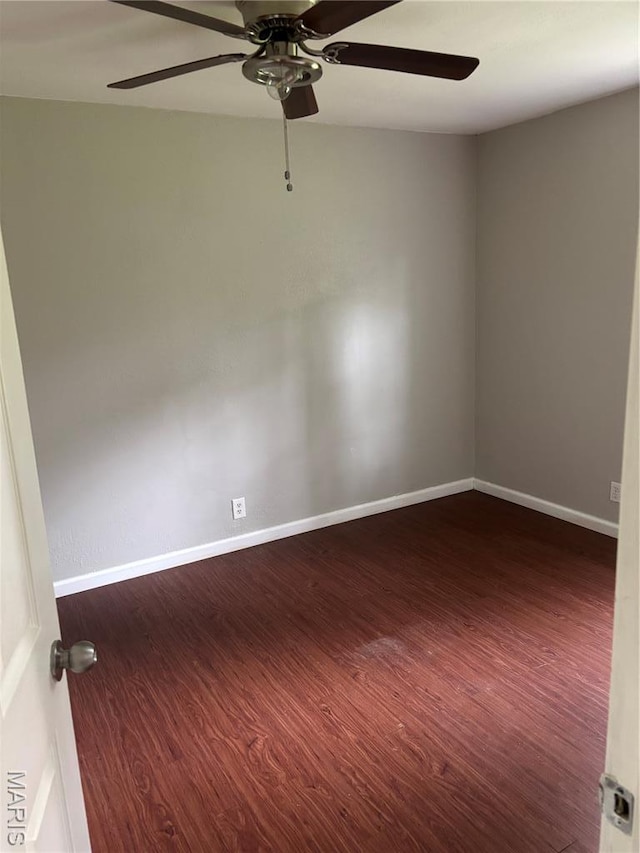 35 Saint Justin Dr E, St Louis, IL 62206 - empty room featuring ceiling fan, wood finished floors, and baseboards