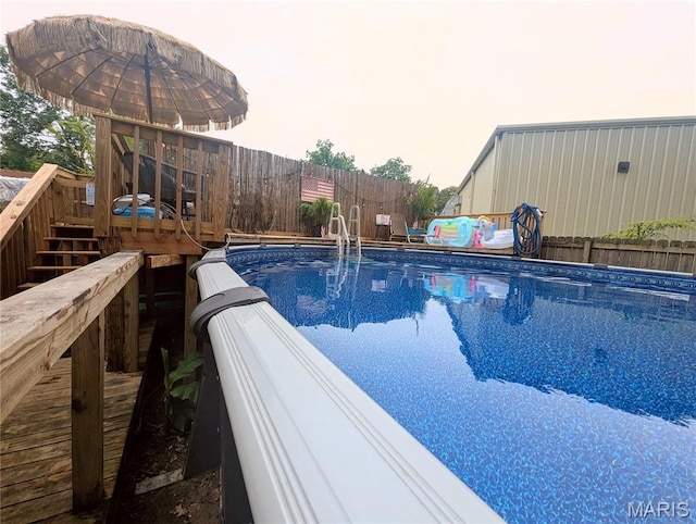 200 N Elm St, Campbell, MO 63933 - view of pool with a fenced backyard and a wooden deck