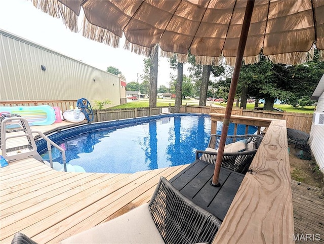 200 N Elm St, Campbell, MO 63933 - view of pool featuring a fenced backyard and a wooden deck