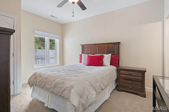 18051 Blue Anchor Dr Unit 533, Gravois Mills, MO 65037 - bedroom featuring light carpet, baseboards, and ceiling fan