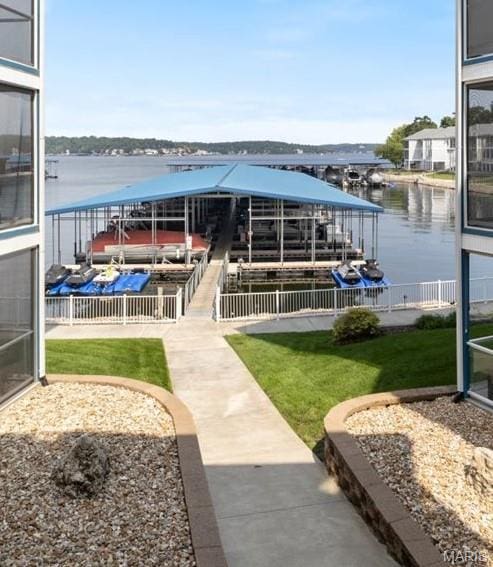 18051 Blue Anchor Dr Unit 533, Gravois Mills, MO 65037 - dock area featuring boat lift, a water view, and a yard