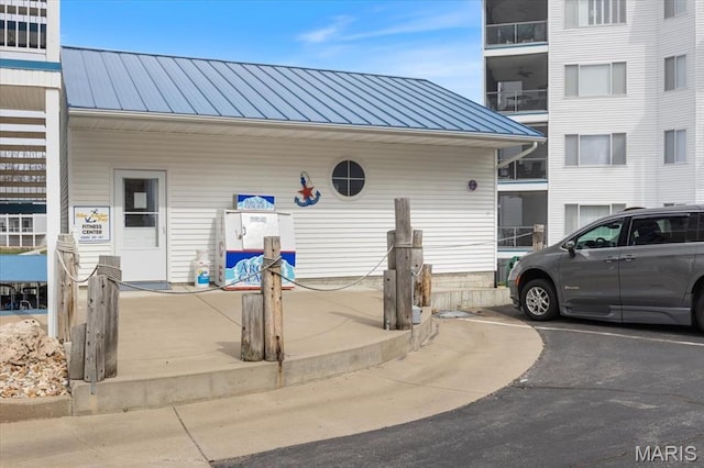 18051 Blue Anchor Dr Unit 533, Gravois Mills, MO 65037 - doorway to property featuring metal roof