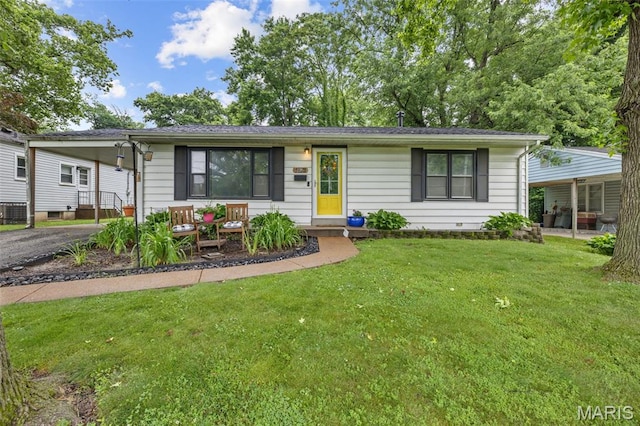 169 W Kirkham Ave, Webster Groves, MO 63119 - ranch-style home featuring a front yard, asphalt driveway, and a carport