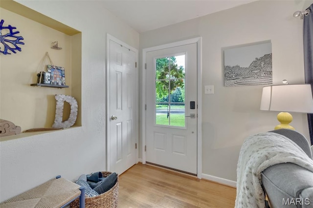 169 W Kirkham Ave, Webster Groves, MO 63119 - foyer with light wood-type flooring and baseboards
