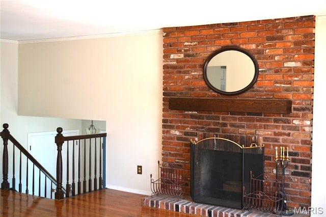 2224 Clayville Ct, Chesterfield, MO 63017 - unfurnished living room featuring wood finished floors, crown molding, baseboards, and a brick fireplace