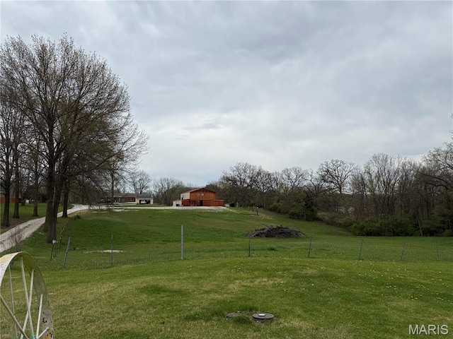 480 N Lindsey Rd, Winfield, MO 63389 - view of yard with a barn, an outdoor structure, and a detached garage