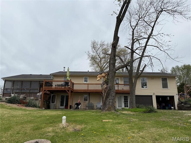 480 N Lindsey Rd, Winfield, MO 63389 - back of house with a garage, a deck, and a yard