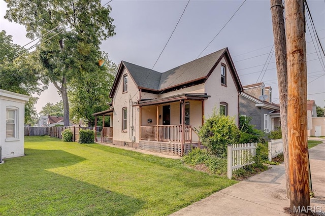 27 N 14th St, Belleville, IL 62220 - view of front of property with a porch, stucco siding, and roof with shingles