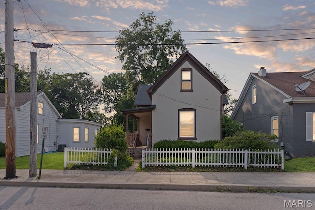 27 N 14th St, Belleville, IL 62220 - view of front of house with a fenced front yard