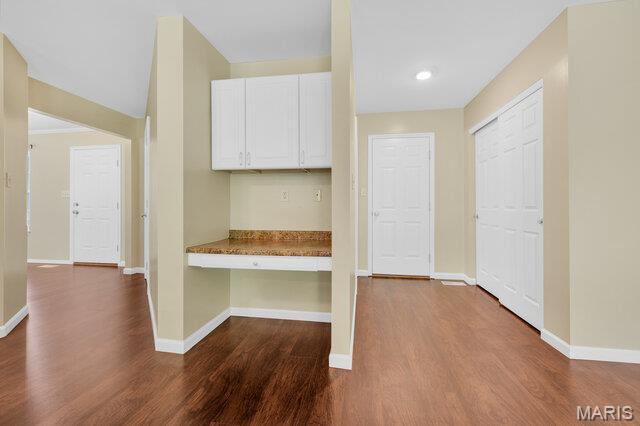 1305 Flintshire Ln, Lake St Louis, MO 63367 - hallway featuring dark wood finished floors