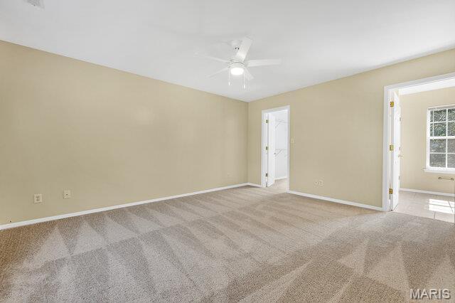 1305 Flintshire Ln, Lake St Louis, MO 63367 - empty room featuring ceiling fan and carpet floors
