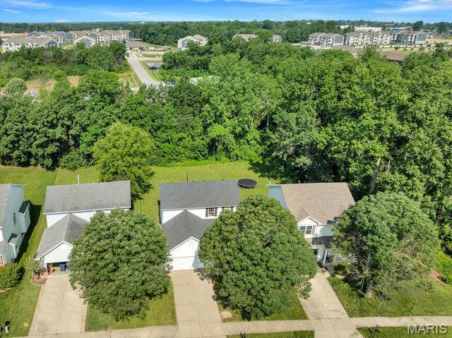 1305 Flintshire Ln, Lake St Louis, MO 63367 - aerial perspective of suburban area