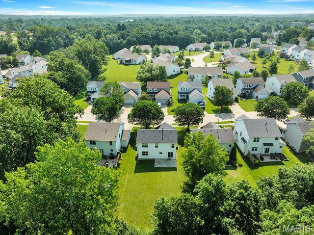 1305 Flintshire Ln, Lake St Louis, MO 63367 - aerial perspective of suburban area