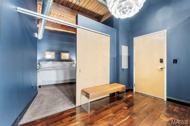 901 Washington Ave Unit 702, Saint Louis, MO 63101 - entrance foyer featuring wood finished floors, wooden ceiling with exposed beams, and baseboards