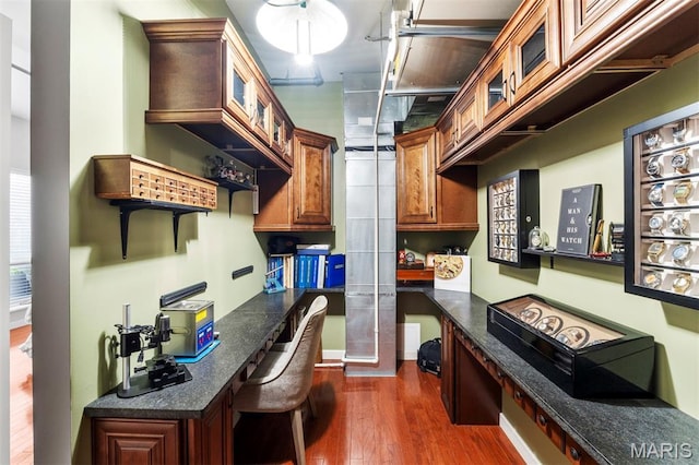 901 Washington Ave Unit 702, Saint Louis, MO 63101 - office space with built in study area and dark wood-style floors
