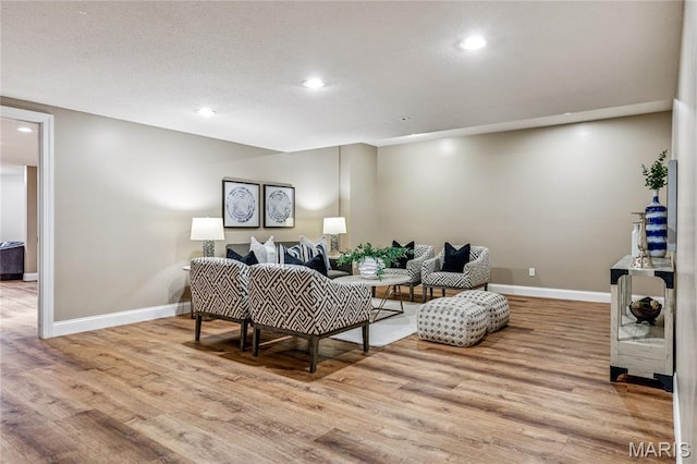 776 Hillenkamp Dr, Weldon Spring, MO 63304 - living area featuring wood finished floors and recessed lighting