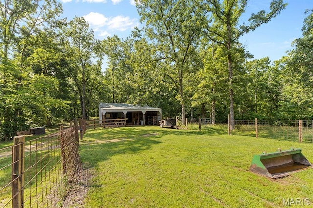 2004 Possum Hollow Rd, Farmington, MO 63640 - view of yard featuring an exterior structure, an outdoor structure, and a forest view