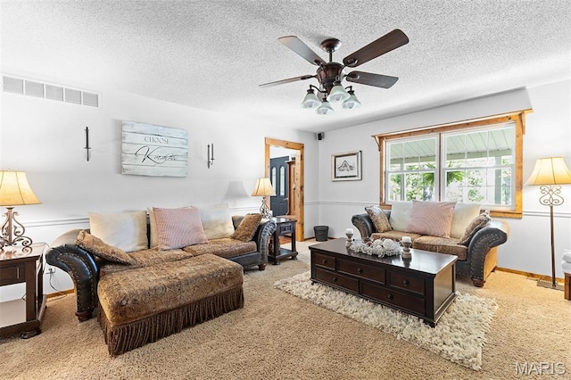 2004 Possum Hollow Rd, Farmington, MO 63640 - living room featuring carpet floors, a ceiling fan, and a textured ceiling
