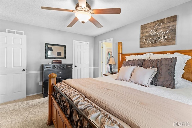 2004 Possum Hollow Rd, Farmington, MO 63640 - carpeted bedroom featuring a ceiling fan, a closet, and baseboards