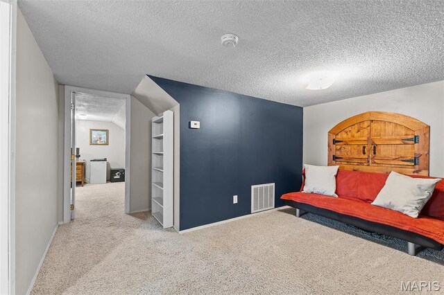 2004 Possum Hollow Rd, Farmington, MO 63640 - living area with carpet flooring, a textured ceiling, and baseboards