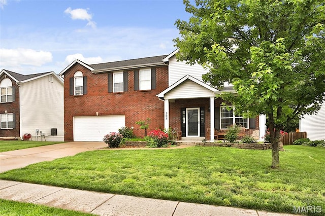 505 Lias Way, Wentzville, MO 63385 - traditional-style home featuring a garage, brick siding, and driveway
