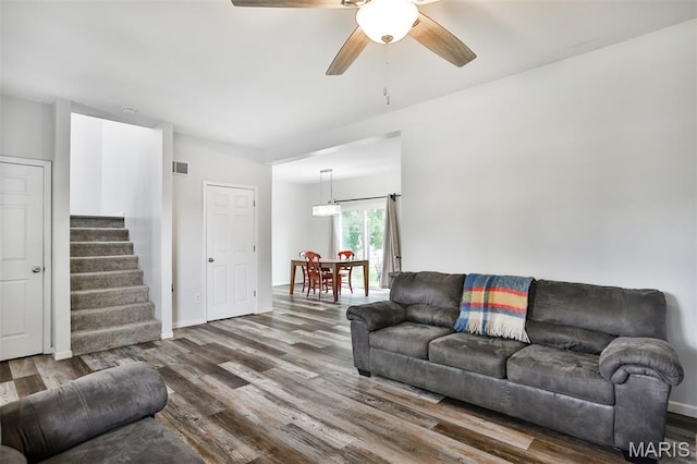 505 Lias Way, Wentzville, MO 63385 - living area with wood finished floors, stairway, and ceiling fan
