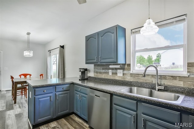 505 Lias Way, Wentzville, MO 63385 - kitchen featuring dishwasher, a peninsula, dark countertops, and plenty of natural light