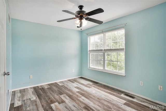 505 Lias Way, Wentzville, MO 63385 - spare room with a ceiling fan and wood finished floors