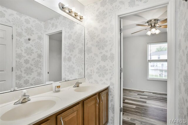 505 Lias Way, Wentzville, MO 63385 - full bathroom with double vanity, wood finished floors, and ceiling fan