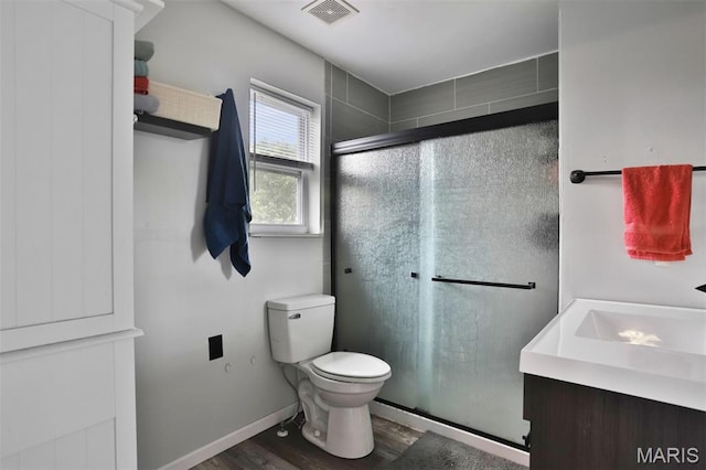 505 Lias Way, Wentzville, MO 63385 - bathroom featuring a shower stall, wood finished floors, and vanity