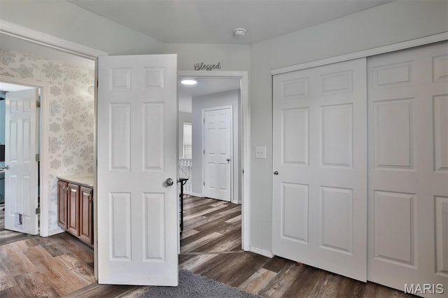 505 Lias Way, Wentzville, MO 63385 - unfurnished bedroom featuring dark wood-style flooring and a closet
