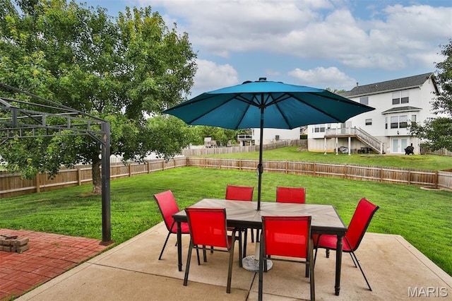 505 Lias Way, Wentzville, MO 63385 - fenced backyard featuring a patio area and outdoor dining space