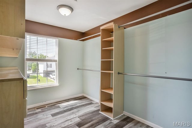 505 Lias Way, Wentzville, MO 63385 - spacious closet featuring wood finished floors