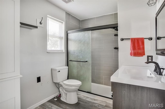 505 Lias Way, Wentzville, MO 63385 - bathroom with vanity, a shower stall, and wood finished floors