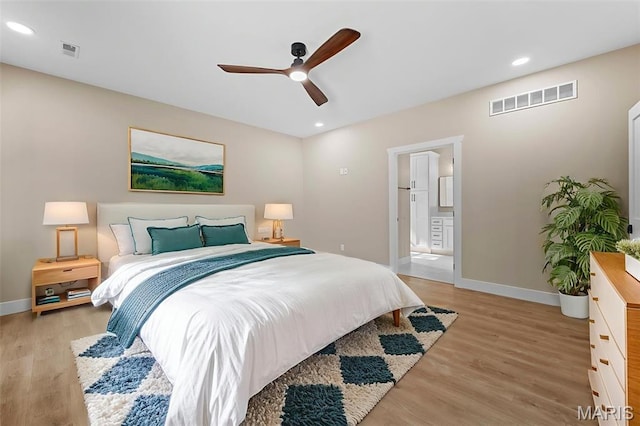 63 Plackemeier Dr, Ofallon, MO 63366 - bedroom featuring baseboards, light wood-type flooring, recessed lighting, ceiling fan, and ensuite bath