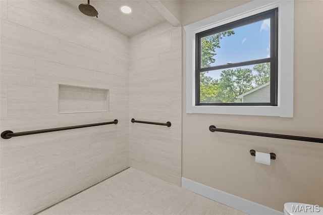 63 Plackemeier Dr, Ofallon, MO 63366 - bathroom with a tile shower and baseboards