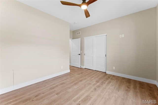 63 Plackemeier Dr, Ofallon, MO 63366 - unfurnished bedroom with light wood-type flooring, baseboards, and a closet