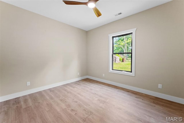 63 Plackemeier Dr, Ofallon, MO 63366 - unfurnished room with wood finished floors, baseboards, and a ceiling fan