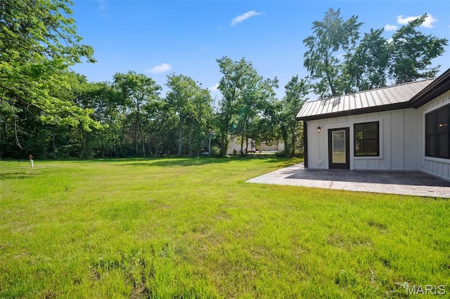 63 Plackemeier Dr, Ofallon, MO 63366 - view of green lawn with a patio