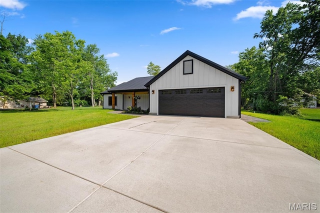 63 Plackemeier Dr, Ofallon, MO 63366 - modern farmhouse with a front lawn, board and batten siding, driveway, and an attached garage