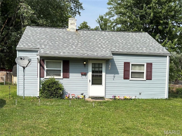 16 Rusty Wil Dr, Belleville, IL 62220 - view of front of house with a shingled roof and a chimney