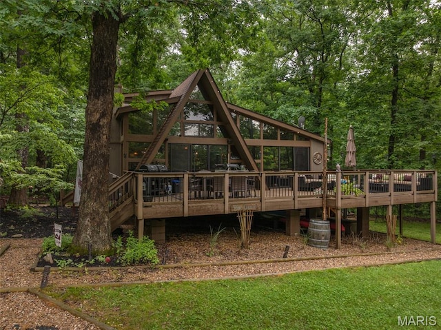 483 Hummingbird View Dr, Innsbrook, MO 63390 - rear view of house with a wooden deck