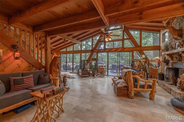 483 Hummingbird View Dr, Innsbrook, MO 63390 - living room with a wooden ceiling with exposed beams, a ceiling fan, and high vaulted ceiling