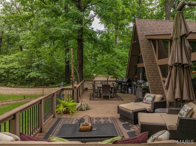 483 Hummingbird View Dr, Innsbrook, MO 63390 - wooden deck featuring outdoor dining space, an outdoor living space, and a grill