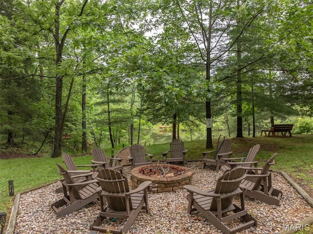 483 Hummingbird View Dr, Innsbrook, MO 63390 - view of patio with a fire pit